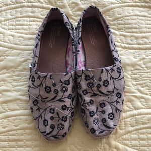 Toms slip on.  Beautiful floral embroidery.